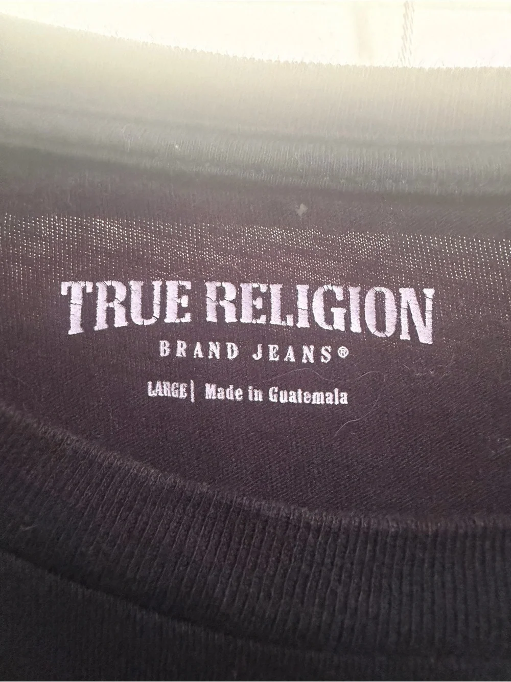 True Religion Black Short-Sleeve Tee with Orange Logo on Green Panel